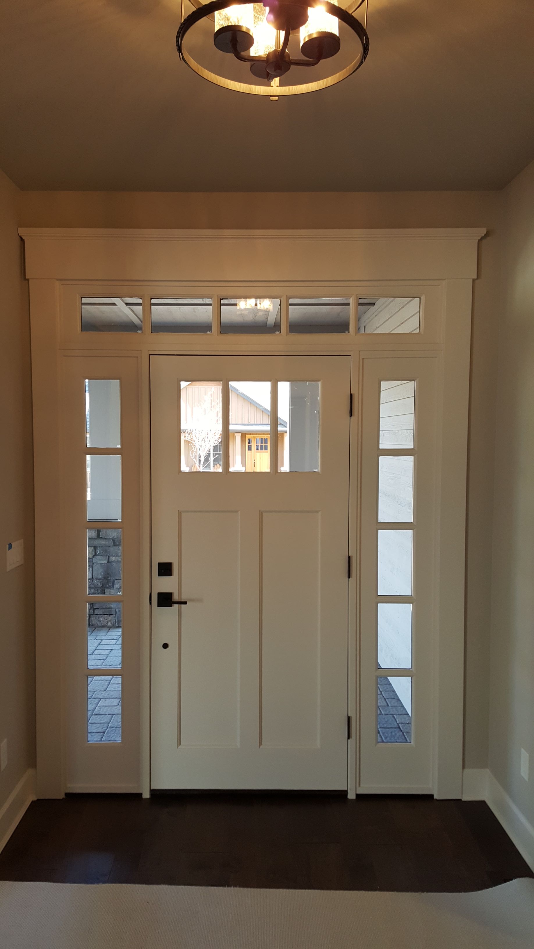 Transom Windows: Enhancing Interior Doors With Overhead Light
