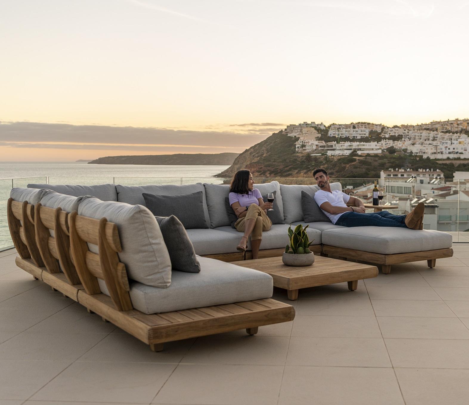 Create A Cozy Outdoor Seating Area With A Teak Sofa